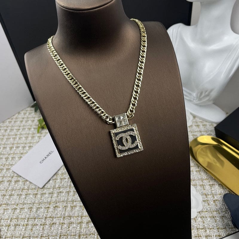 18K  Chanel Metal & Diamond Pendant Necklace